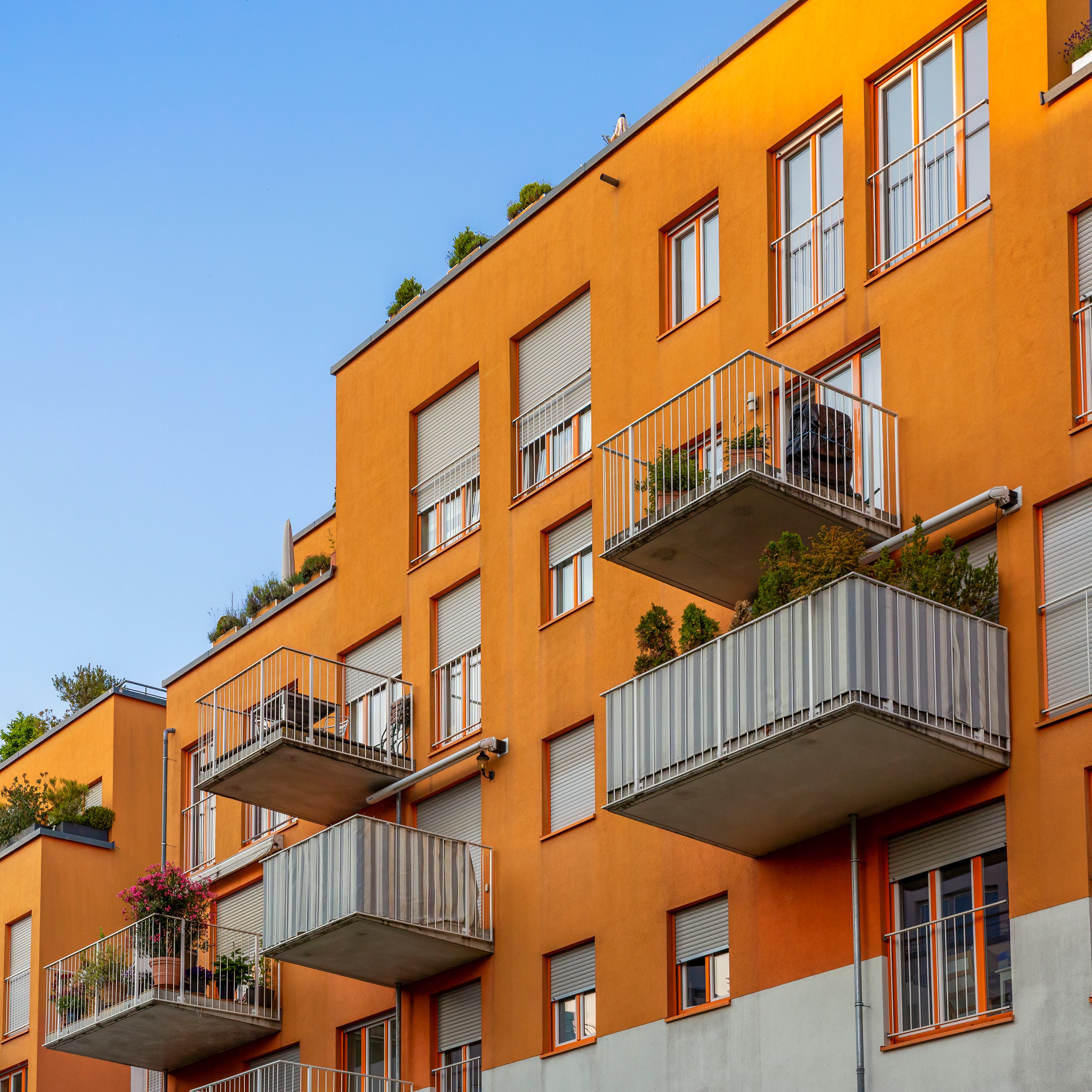 GettyImages-2216511333_ornage building_1x1.jpg