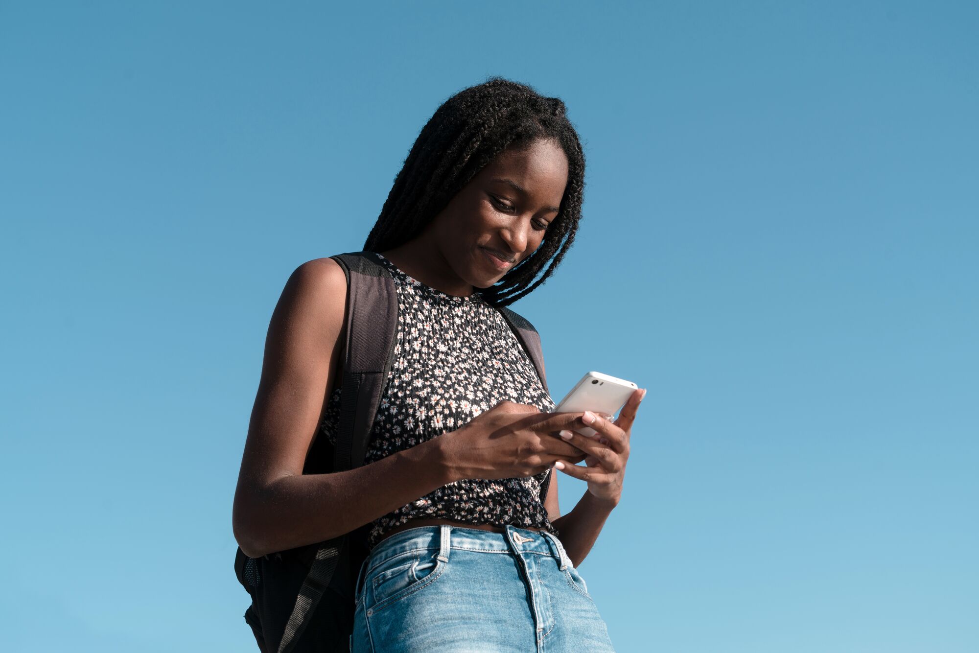 Stocksy_2841711_Girl with phone